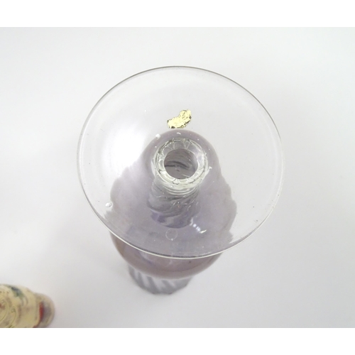 301 - A quantity of assorted glassware to include pedestal blue glass vases, candlesticks, decanters, pede... 