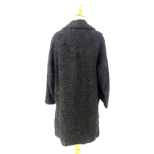 307 - Vintage fashion / clothing: A beaver lamb / mouton fur style coat, button fastening to the front, bu... 