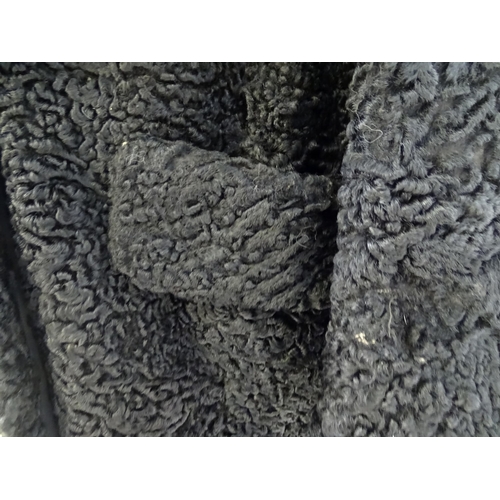 307 - Vintage fashion / clothing: A beaver lamb / mouton fur style coat, button fastening to the front, bu... 