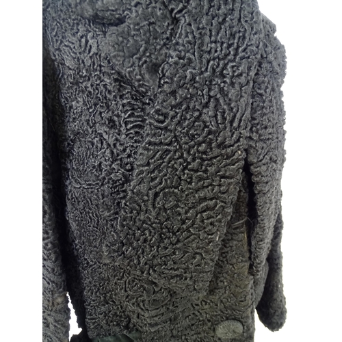 307 - Vintage fashion / clothing: A beaver lamb / mouton fur style coat, button fastening to the front, bu... 