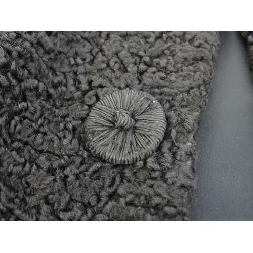 307 - Vintage fashion / clothing: A beaver lamb / mouton fur style coat, button fastening to the front, bu... 