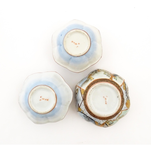 336 - Three Japanese pots and covers decorated in the Satsuma palette with figures, Mount Fuji landscapes,... 