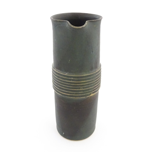 342 - Five studio pottery items by Deborah Hopson Wolpe, comprising ewer, bowl, and three beakers each wit... 