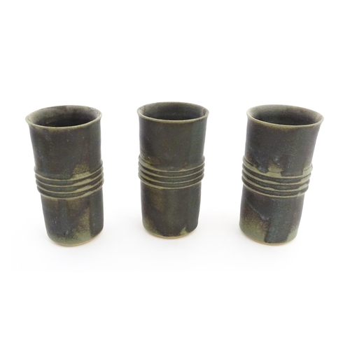 342 - Five studio pottery items by Deborah Hopson Wolpe, comprising ewer, bowl, and three beakers each wit... 