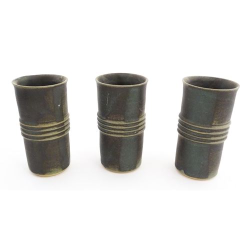 342 - Five studio pottery items by Deborah Hopson Wolpe, comprising ewer, bowl, and three beakers each wit... 