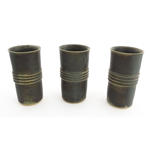 342 - Five studio pottery items by Deborah Hopson Wolpe, comprising ewer, bowl, and three beakers each wit... 