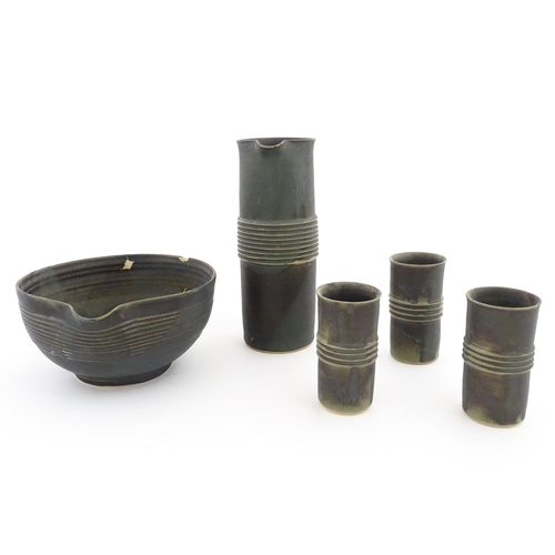 342 - Five studio pottery items by Deborah Hopson Wolpe, comprising ewer, bowl, and three beakers each wit... 