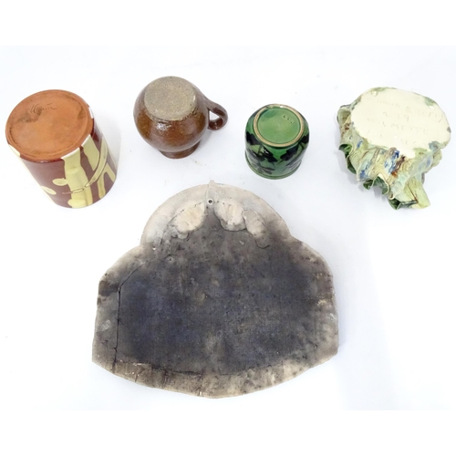 345 - A quantity of studio pottery wares to include a vase / beaker of cylindrical form with slip decorati... 