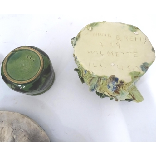 345 - A quantity of studio pottery wares to include a vase / beaker of cylindrical form with slip decorati... 