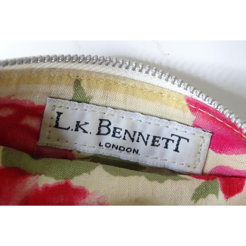 360 - A Kurt Geiger bag with heart detail and an L. K. Bennett purse with bow detail. Largest approx. 9 1/... 