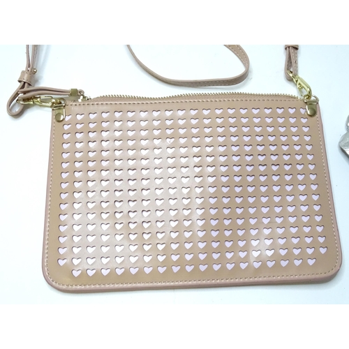 360 - A Kurt Geiger bag with heart detail and an L. K. Bennett purse with bow detail. Largest approx. 9 1/... 