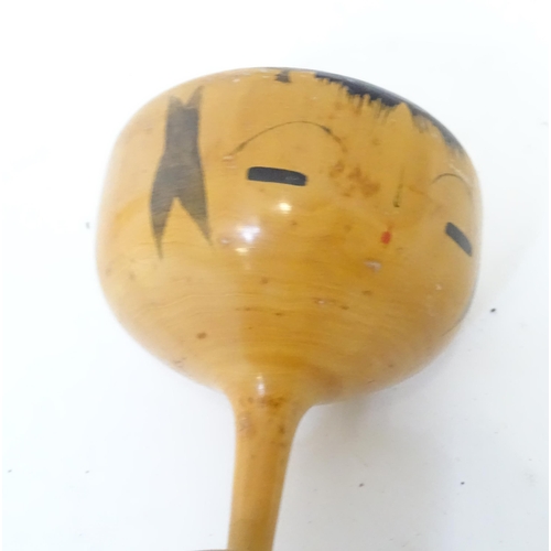 369 - A Japanese turned wooden Kokeshi style doll with painted detail. Together with a wooden model of a h... 