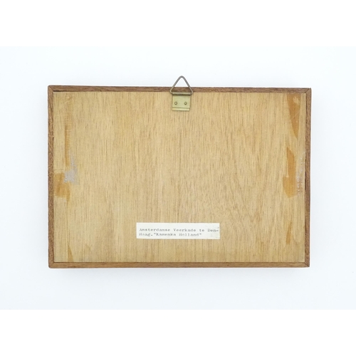 378 - A Dutch hand painted tableau comprising six tiles depicting a street scene with a figure, signed Kam... 