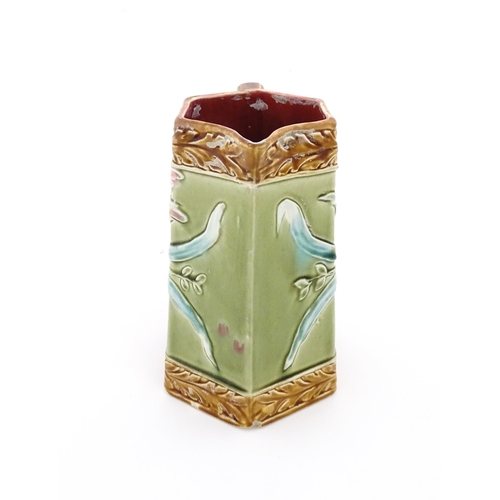 380 - A French Jugendstil / Art Nouveau majolica jug of hexagonal form by Gustave de Bruyn, decorated with... 