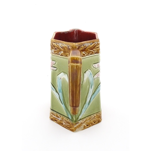 380 - A French Jugendstil / Art Nouveau majolica jug of hexagonal form by Gustave de Bruyn, decorated with... 