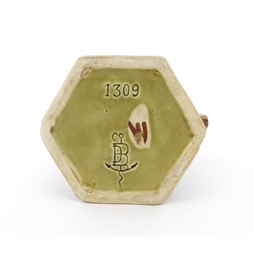 380 - A French Jugendstil / Art Nouveau majolica jug of hexagonal form by Gustave de Bruyn, decorated with... 