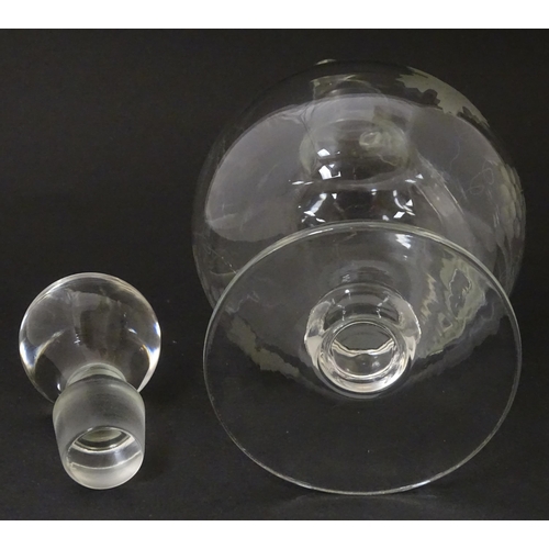 387 - A 20thC glass decanter with etched fruiting detail. Together with six matching drinking glasses. Dec... 