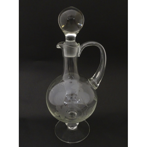 387 - A 20thC glass decanter with etched fruiting detail. Together with six matching drinking glasses. Dec... 