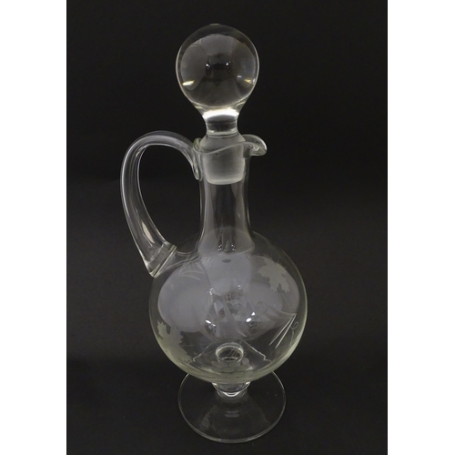 387 - A 20thC glass decanter with etched fruiting detail. Together with six matching drinking glasses. Dec... 