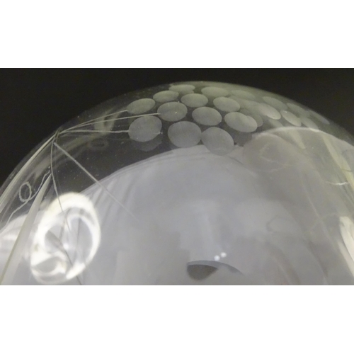 387 - A 20thC glass decanter with etched fruiting detail. Together with six matching drinking glasses. Dec... 