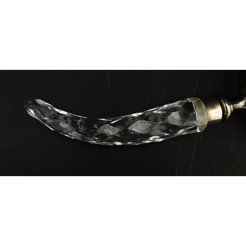 402 - A 20thC magnifying glass with cut glass handle. Approx. 10 3/4