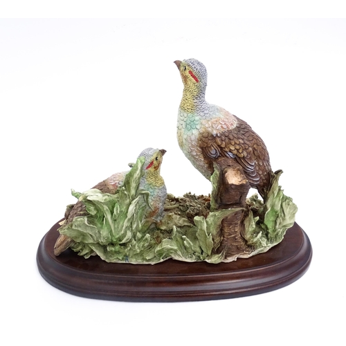 420 - A Capodimonte model of grouse birds, designed by Giuseppe Armani. Approx. 7 3/4