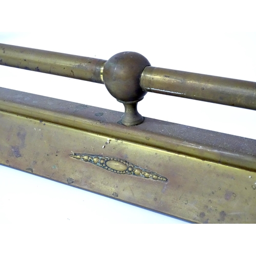 609 - A brass fire fender, with swag style detail, approx 54