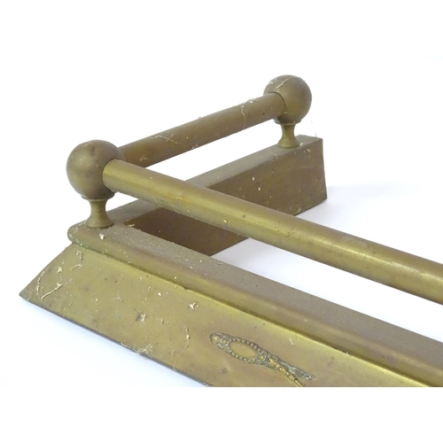 609 - A brass fire fender, with swag style detail, approx 54