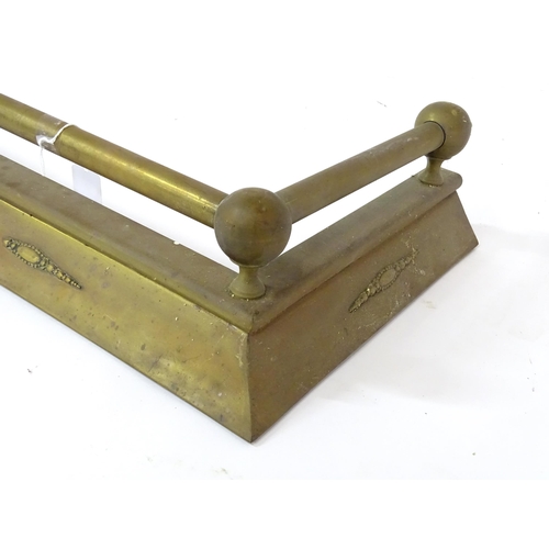 609 - A brass fire fender, with swag style detail, approx 54