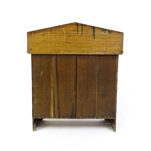 611 - A 19thC simulated oak chiffonier with a pointed upstand above turned supports and two panelled doors... 