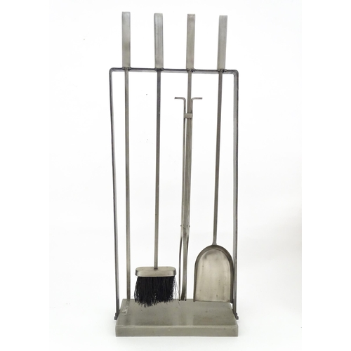 616 - A fireside companion set comprising poker, tongs, brush and shovel. Approx. 31 1/4