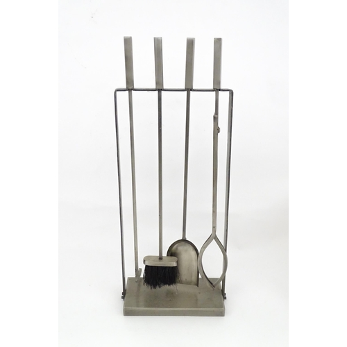 616 - A fireside companion set comprising poker, tongs, brush and shovel. Approx. 31 1/4