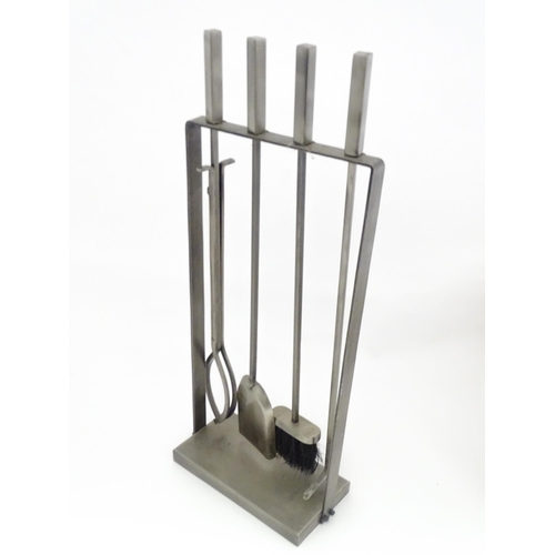 616 - A fireside companion set comprising poker, tongs, brush and shovel. Approx. 31 1/4