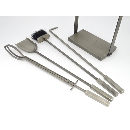 616 - A fireside companion set comprising poker, tongs, brush and shovel. Approx. 31 1/4