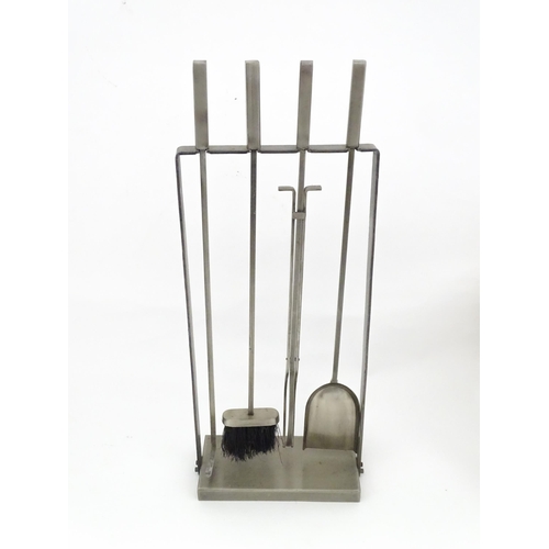 616 - A fireside companion set comprising poker, tongs, brush and shovel. Approx. 31 1/4