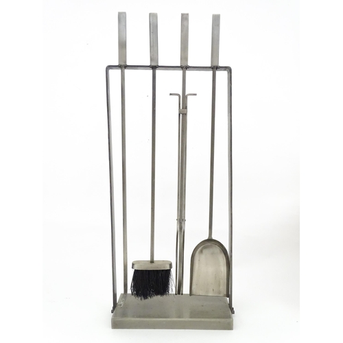 616 - A fireside companion set comprising poker, tongs, brush and shovel. Approx. 31 1/4