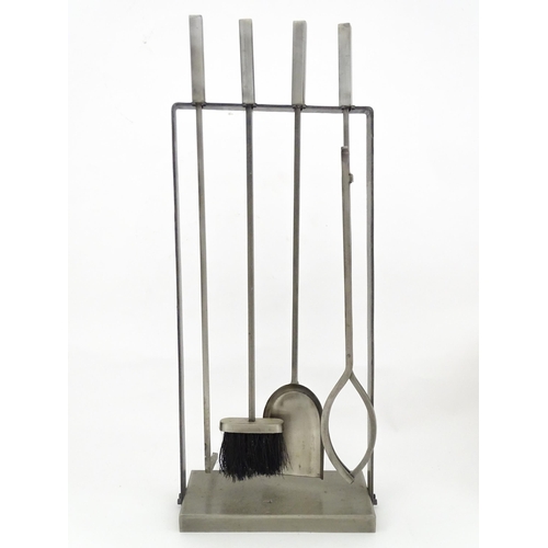 616 - A fireside companion set comprising poker, tongs, brush and shovel. Approx. 31 1/4