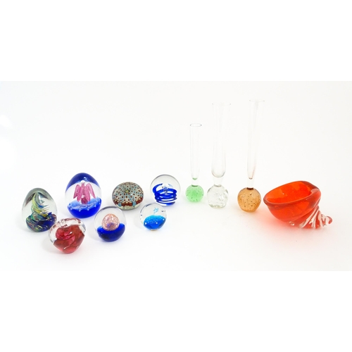 618 - A quantity of assorted art glass paperweights and vases, to include bud vases and a Murano style gla... 
