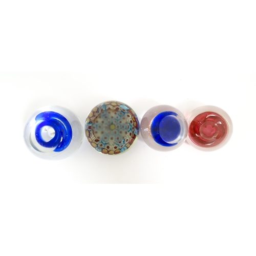 618 - A quantity of assorted art glass paperweights and vases, to include bud vases and a Murano style gla... 