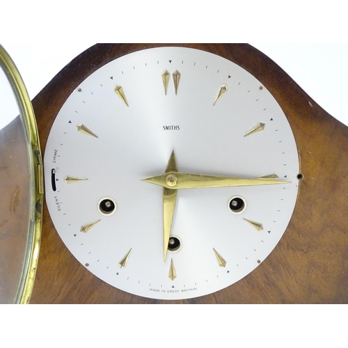 620 - A 20thC smiths walnut cased mantle clock with chiming movement.  Approx. 8