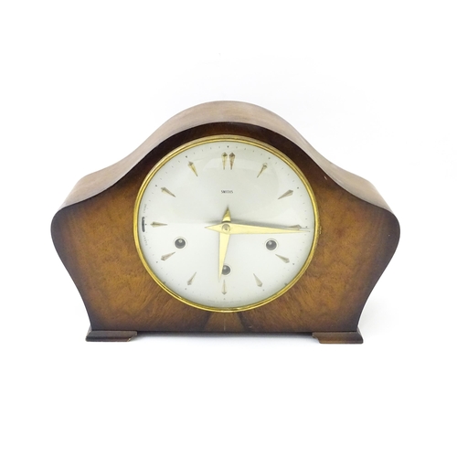 620 - A 20thC smiths walnut cased mantle clock with chiming movement.  Approx. 8