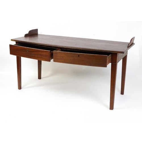 630 - An 18thC mahogany tea table raised on five chamfered tapered legs. 36