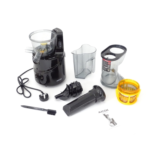 648 - An Aicok slow juicer kit, with motor unit, jugs, separator basket and operating instructions etc. Ap... 