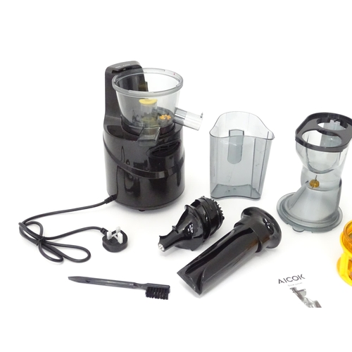 648 - An Aicok slow juicer kit, with motor unit, jugs, separator basket and operating instructions etc. Ap... 