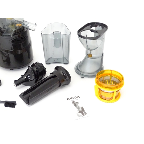 648 - An Aicok slow juicer kit, with motor unit, jugs, separator basket and operating instructions etc. Ap... 