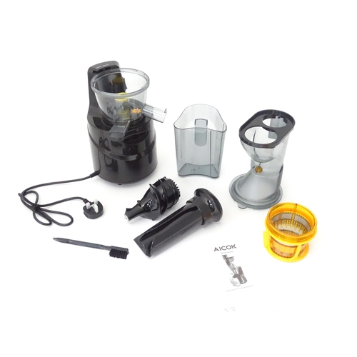 648 - An Aicok slow juicer kit, with motor unit, jugs, separator basket and operating instructions etc. Ap... 