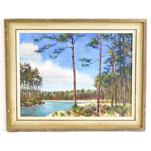 Joan Cavalier, 20th century, Oil on canvas, A lake scene bordered by pine trees. Signed lower left. Approx. 17 1/2" x 23 1/2"