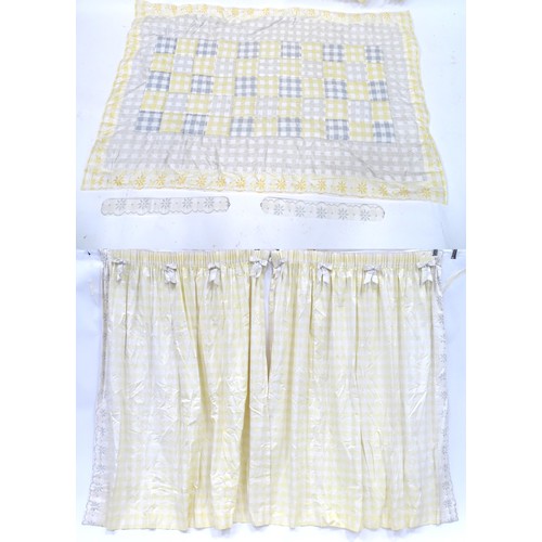 657 - A pair of curtains decorated in a yellow and white check pattern with bow detail. Together with a ma... 