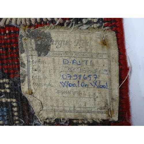 699 - Carpet / Rug : A pale blue ground runner decorated with repeating geometric motifs and banded border... 