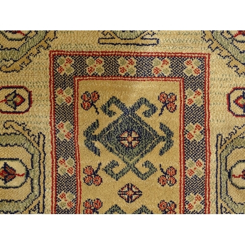 706 - Carpet / Rug  : Two runners with banded motifs to the central ochre coloured ground bordered by flor... 